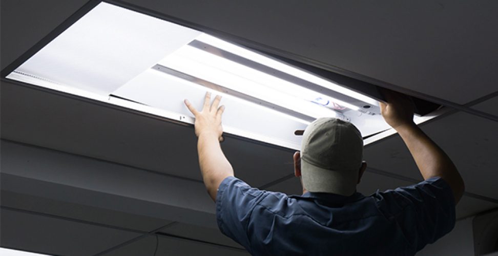 the-man-checking-or-changing-fluorescent-light-tube